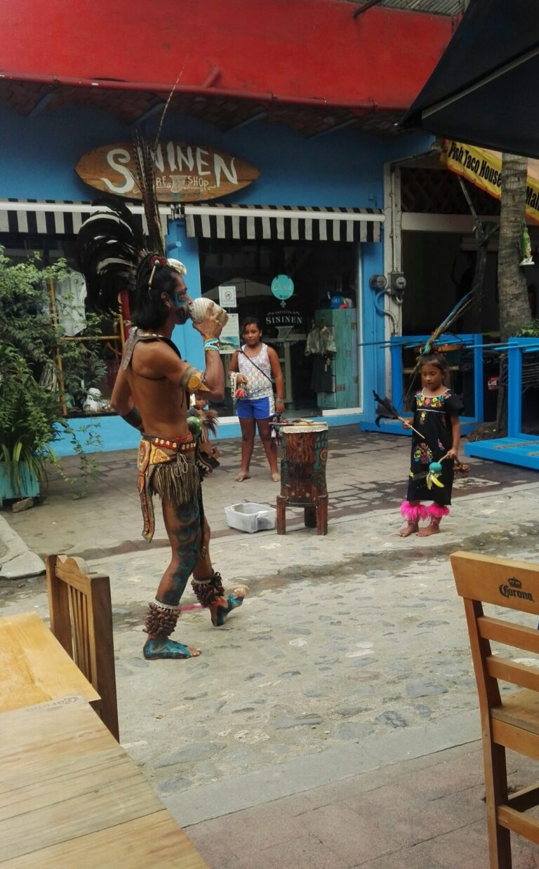 street performers in Mayan costume