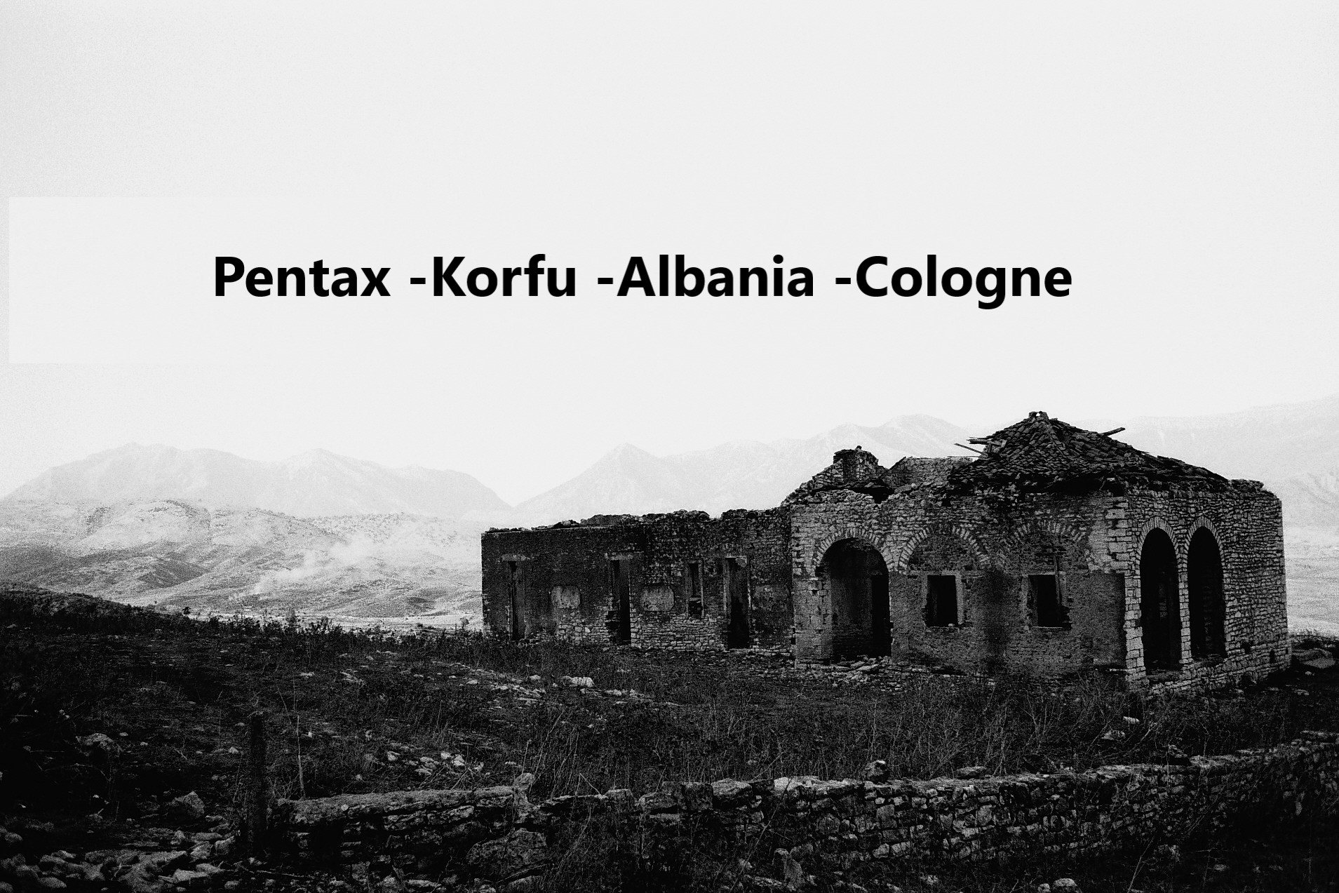 Pentax black and white ruin of house on top of valley in Albania