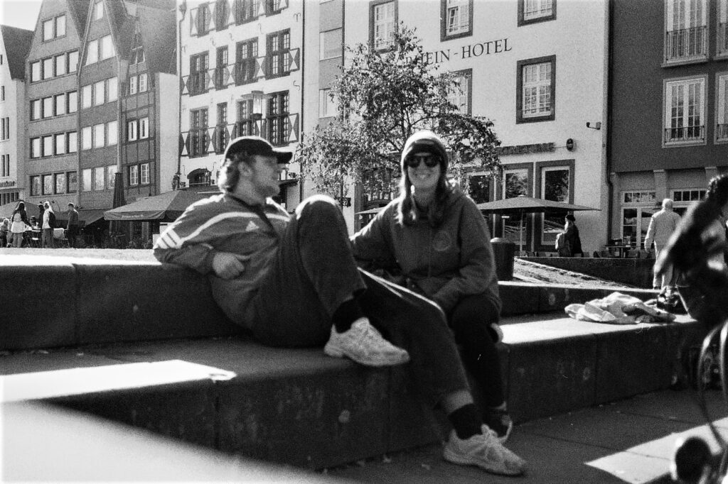 me and my brother on the steps in cologne old town center